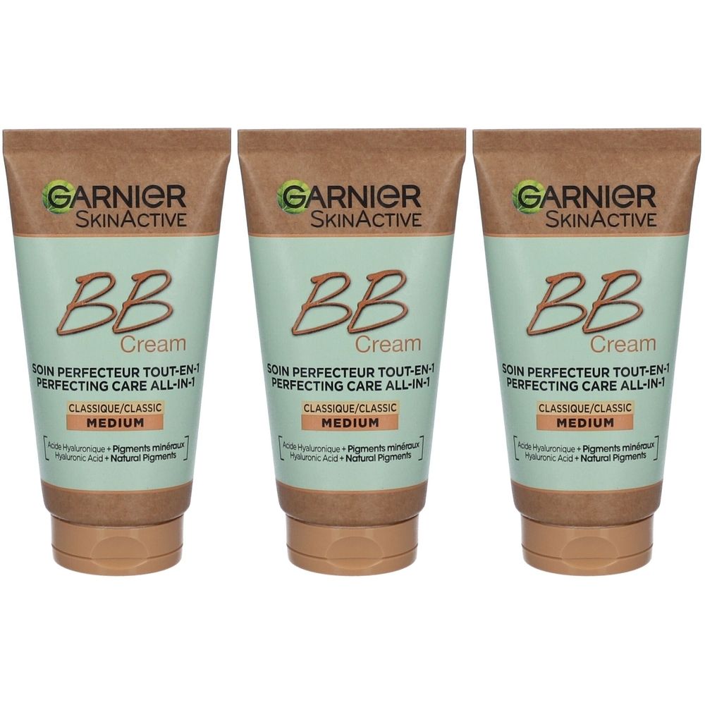 Drei Tuben Garnier SkinActive BB Cream. Aufschrift: BB Cream, Medium. Verpackung in Braun, Grün und Beige. Text in Französisch.