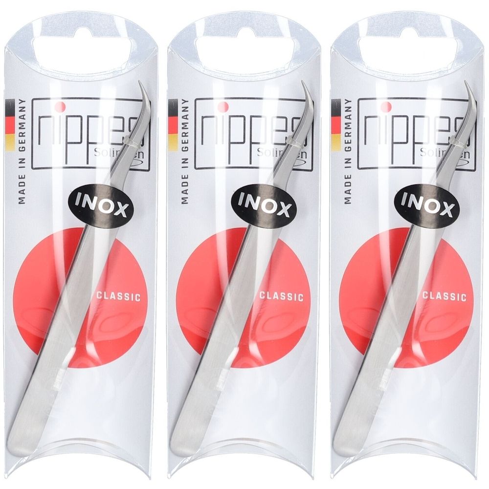 Drei Zeckenpinzetten in Verpackung. Metall, abgewinkelt. Aufschrift: INOX, CLASSIC, MADE IN GERMANY. Verpackung mit Aufhängung.