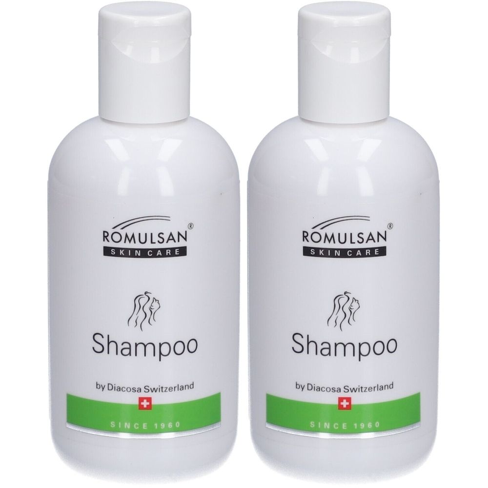 Deux flacons de shampooing blancs avec bouchon rabattable. Inscription : ROMULSAN SKIN CARE, Shampoo, by Diacosa Switzerland. Bande verte avec croix suisse.