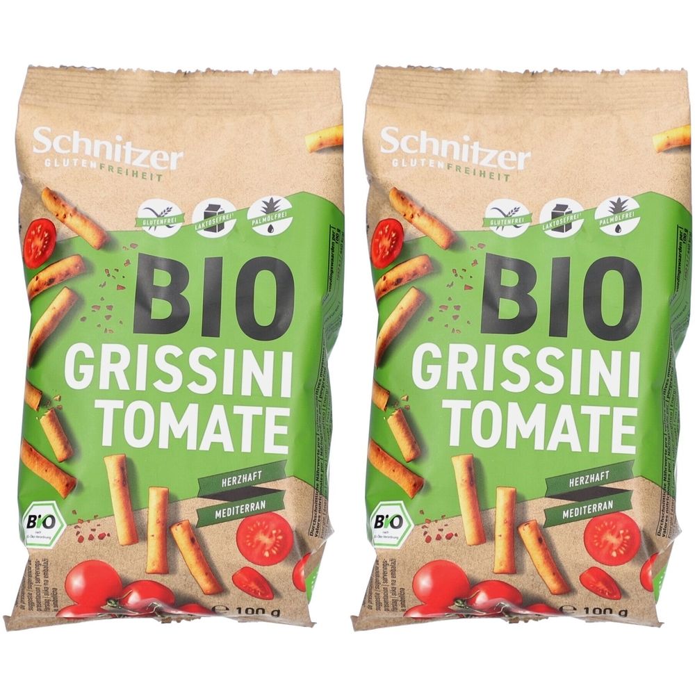 Deux paquets de Grissini Tomate. Inscription : BIO, sans gluten, méditerranéen. Marque : Schnitzer. Avec tomates et grissini.
