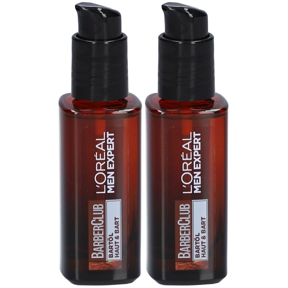 Zwei Flaschen Bartöl. Braune Glasflaschen mit schwarzem Pumpkopf. Aufschrift: L'Oréal Men Expert Barber Club Bartöl.