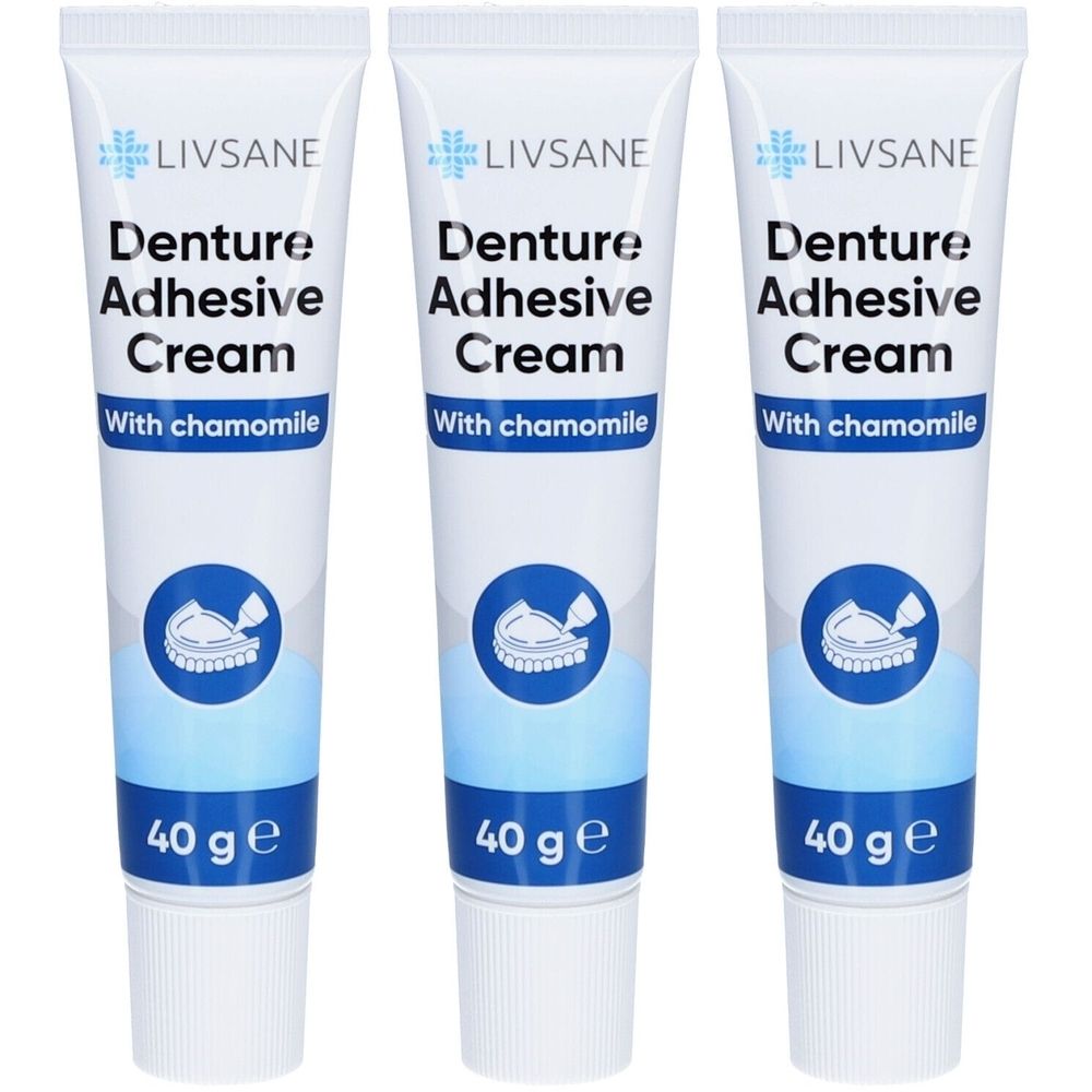 Drei Tuben Haftcreme. Aufschrift: LIVSANE, Denture Adhesive Cream, With chamomile. Unten: 40 g e. Blau-weißes Design mit Zahnsymbol.