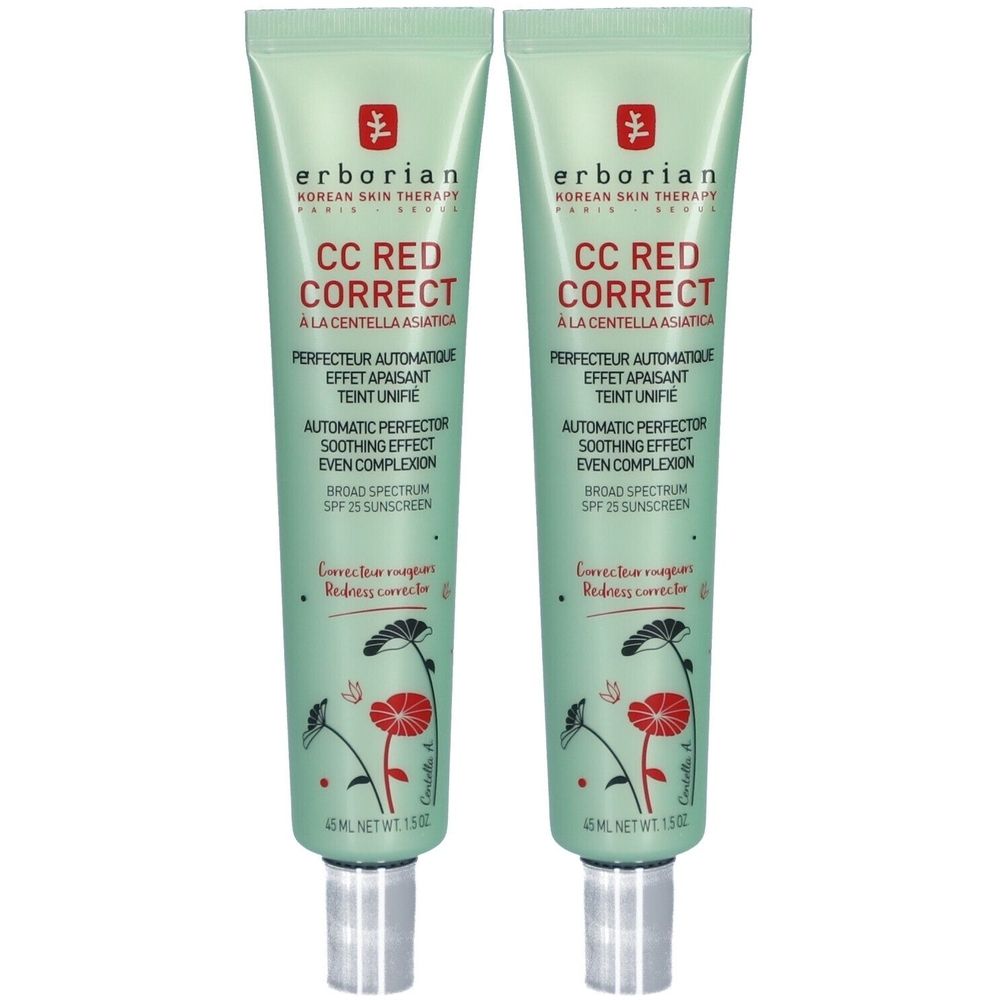 Zwei grüne Tuben mit Aufschrift CC Red Correct. Enthält Text in Französisch und Englisch. Mit floralem Design und silbernen Verschlüssen.