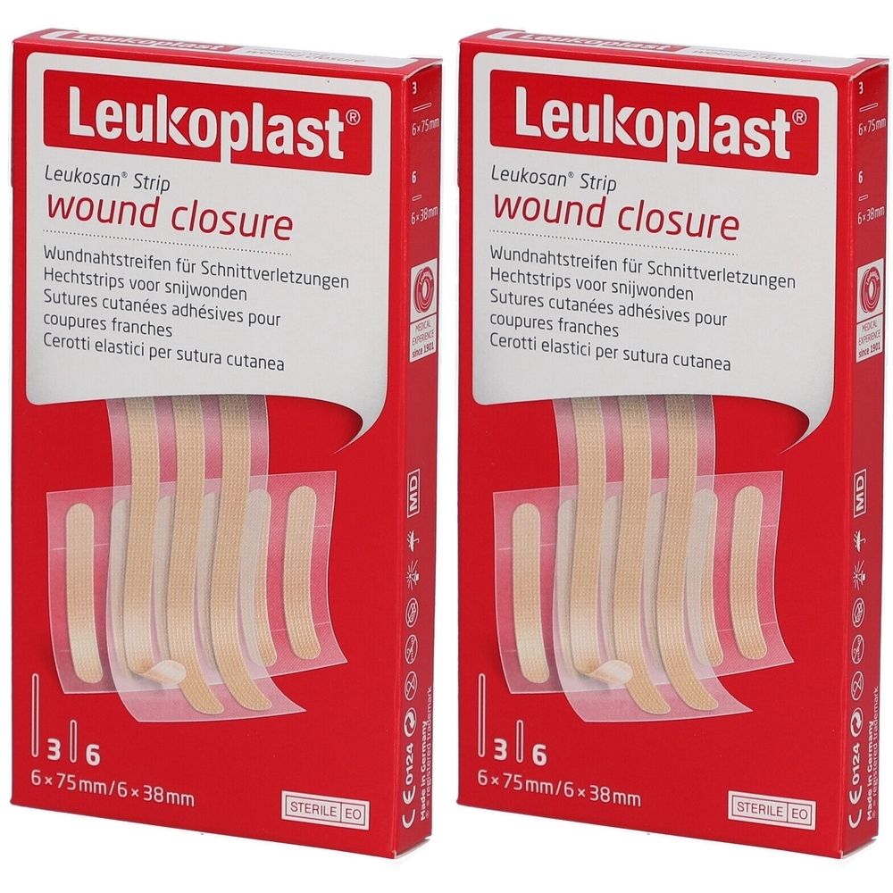 Deux boîtes de sutures adhésives Leukoplast. Emballage rouge avec nom et image du produit. Stérile.