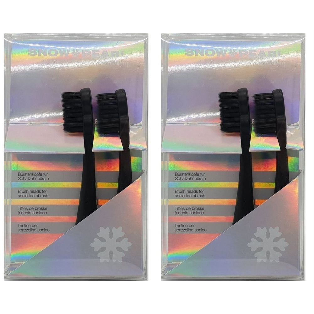 Zwei Packungen Ersatzköpfe für Schallzahnbürsten. Schwarze Borsten, schwarze Griffe. Verpackung mit Produktnamen und Schneeflocke.