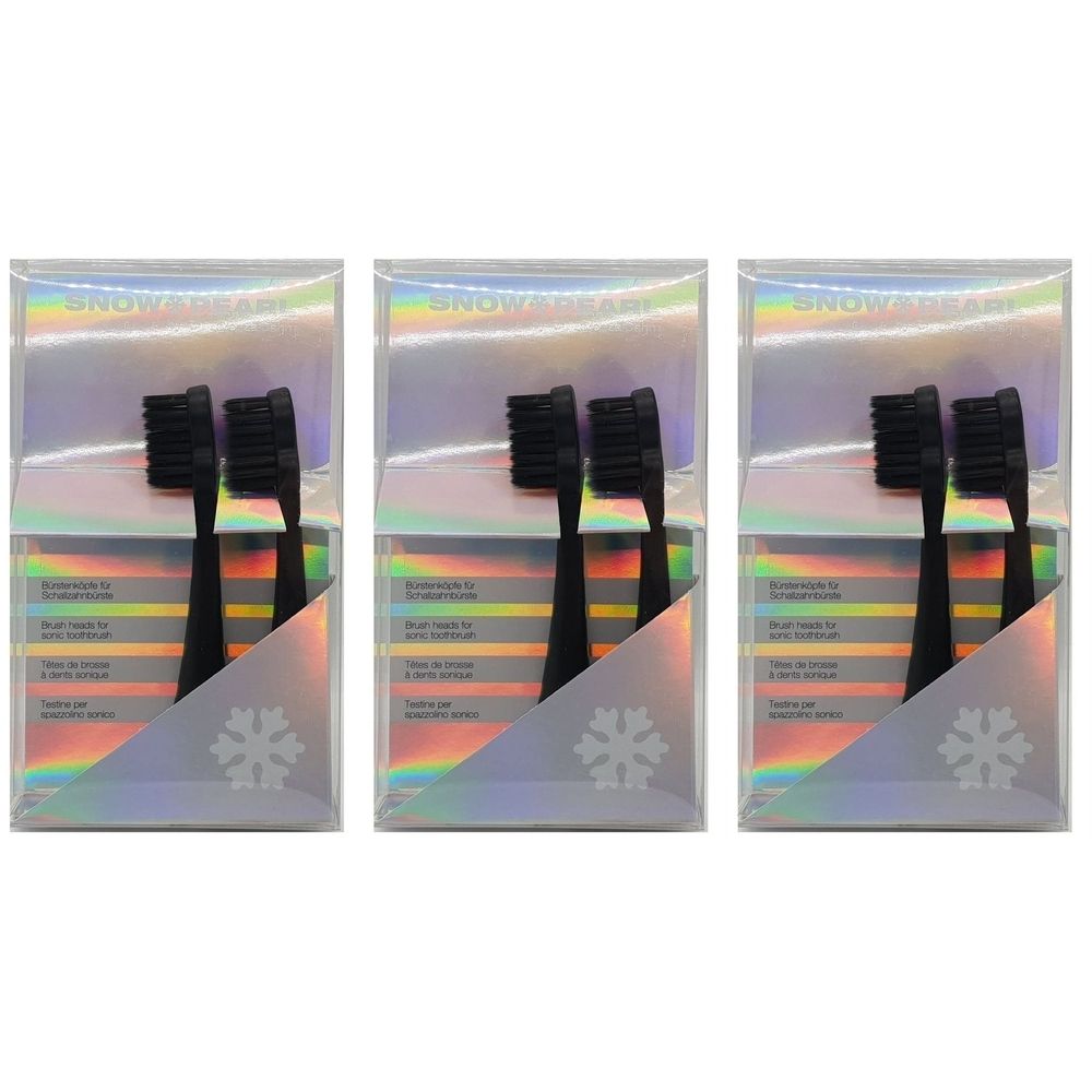 Drei Packungen Ersatzköpfe. Schwarze Borsten, schwarzer Griff. Verpackung mit holografischem Hintergrund und Produktnamen.