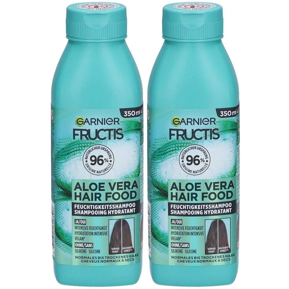 Zwei Flaschen Shampoo. Türkisgrüne Flaschen mit blauem Deckel. Aufschrift: Garnier Fructis Aloe Vera Hair Food. 350ml.