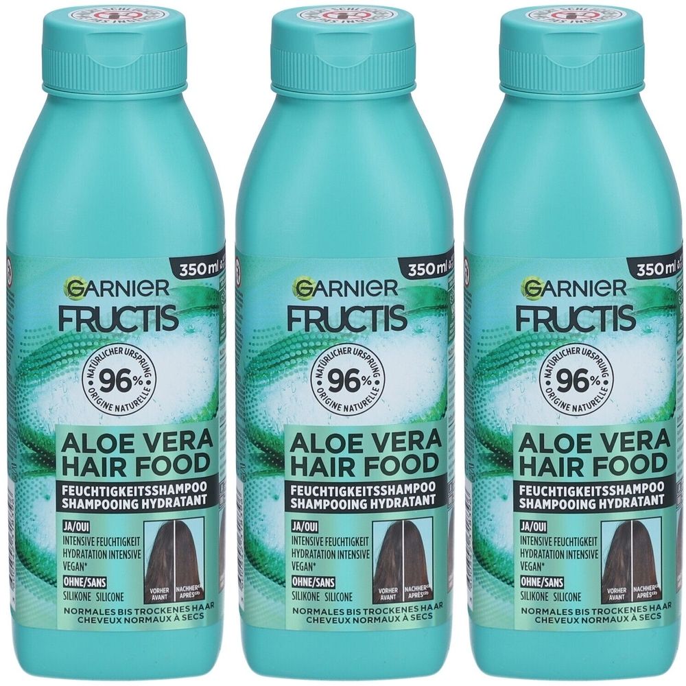 Drei Flaschen Shampoo. Türkisgrüne Flaschen mit weißer Schrift. Aufschrift: Garnier Fructis Aloe Vera Hair Food.