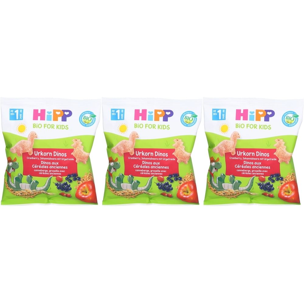 Drei Beutel HIPP Bio Dinos. Aufdruck: Urkorn Dinos, Bio For Kids. Abbildung von Dinosauriern und Früchten.