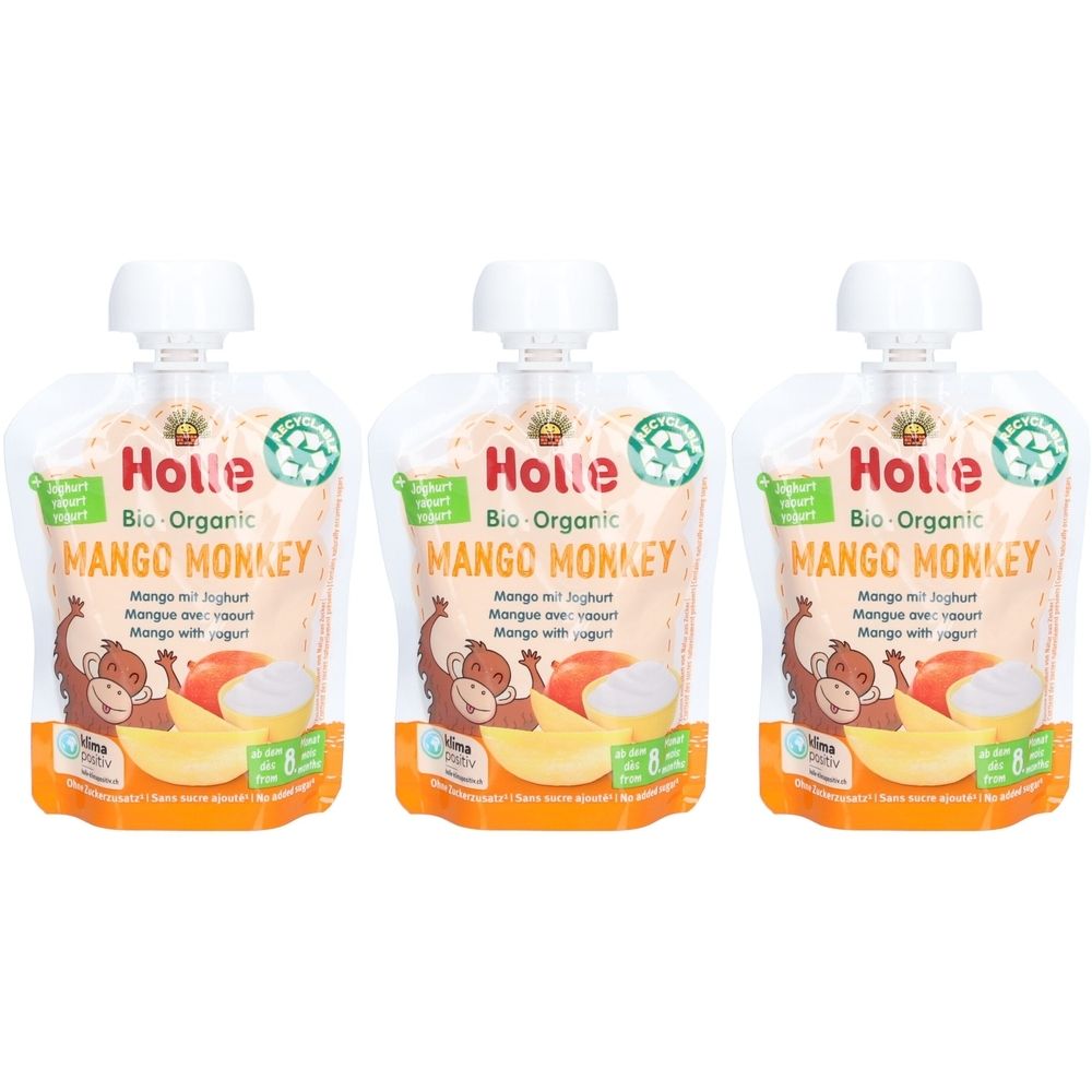 Drei Beutel Holle Bio-Organic Mango Monkey. Aufdrucke: Mango mit Joghurt, Bio-Siegel, Affen-Illustration, Baby-Logo.
