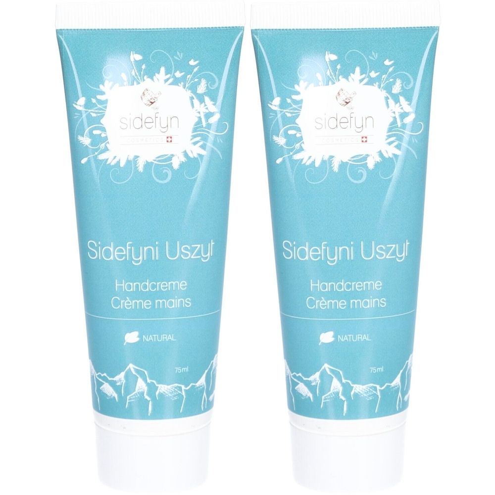Deux tubes de crème pour les mains. Tubes bleu clair avec texte et logo blancs. Inscription : Sidefyni Uszyt, Handcreme, Crème mains.