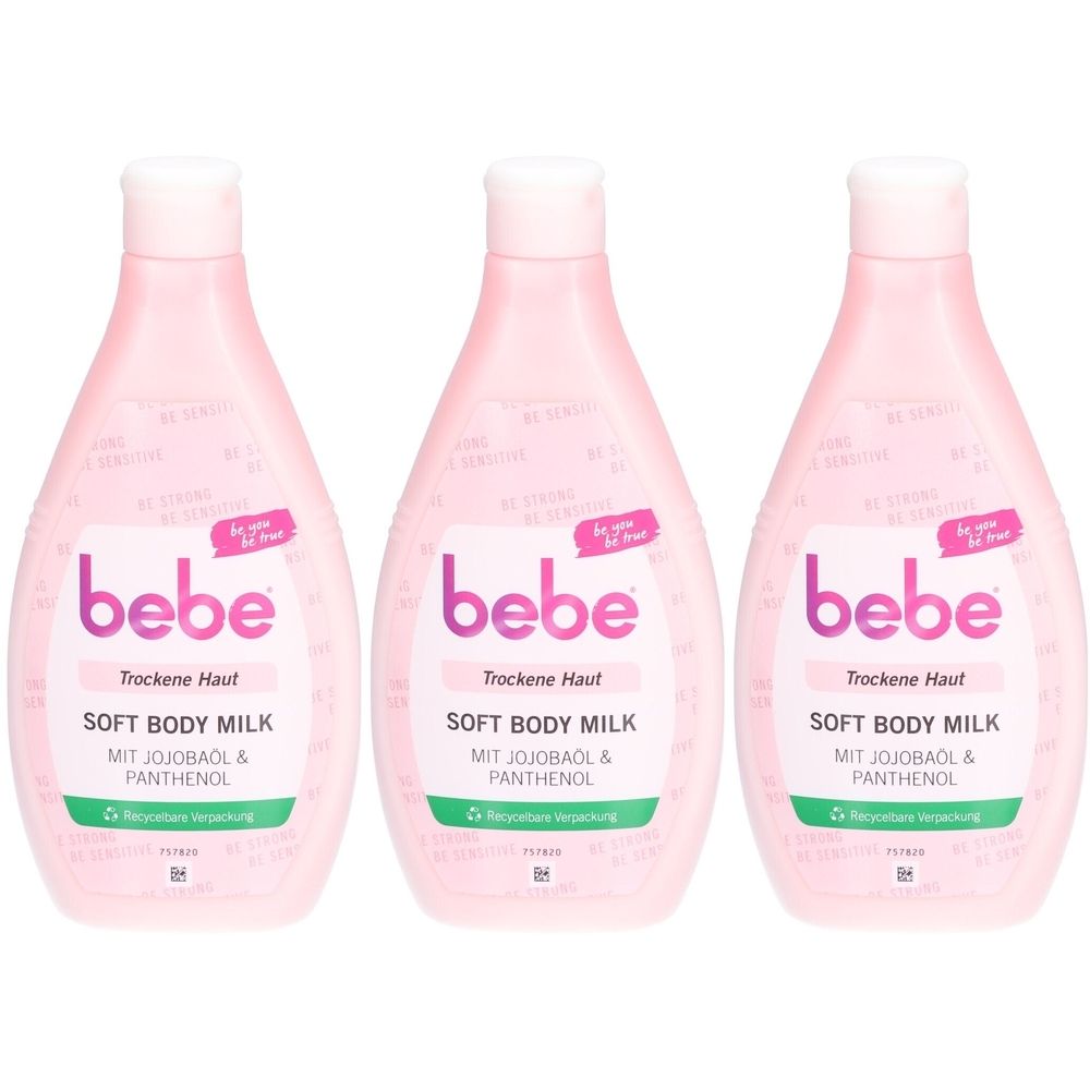 Drei rosa Flaschen bebe® Soft Body Milk. Aufschrift: Trockene Haut, mit Jojobaöl & Panthenol. Weißer Deckel, pinkes Etikett.