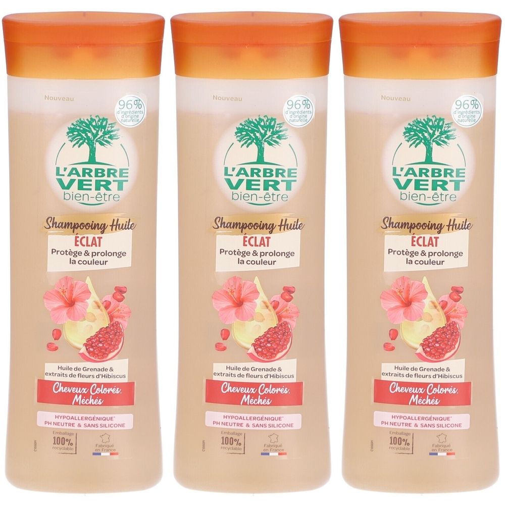 Trois flacons de shampooing huile. Inscription: L'ARBRE VERT bien-être, Shampooing Huile ECLAT, pour cheveux colorés. 96% d'ingrédients naturels.