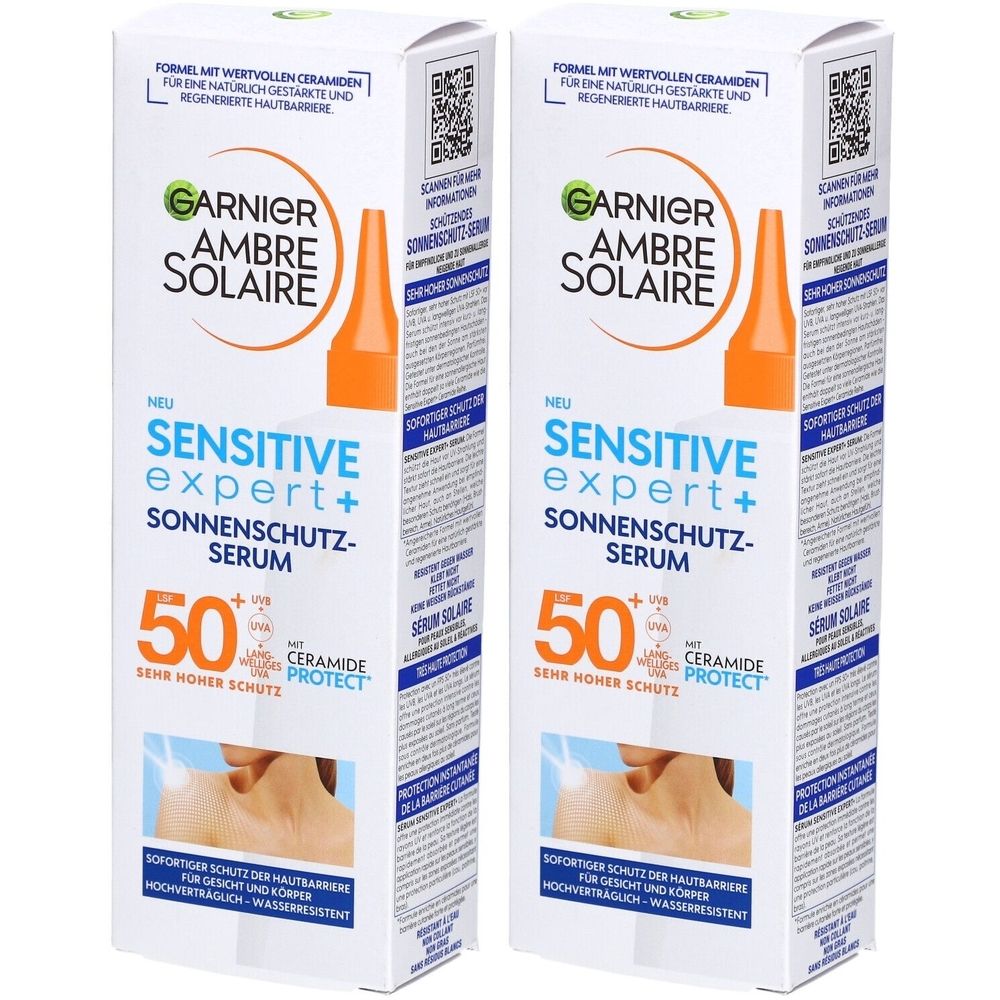 Zwei Kartons Garnier Ambre Solaire Sonnenschutz-Serum. Aufschrift: Sensitive Expert+, Lichtschutzfaktor 50, Ceramide Protect.