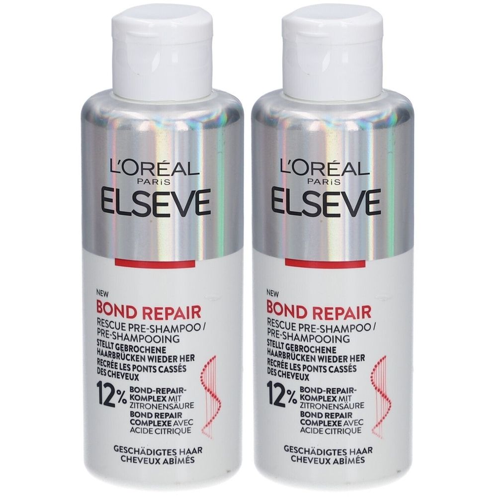 Deux flacons L'Oréal Paris Elseve Bond Repair Pre-Shampoo. Bouchons blancs, flacons argentés avec texte rouge et blanc. Texte: Bond Repair.