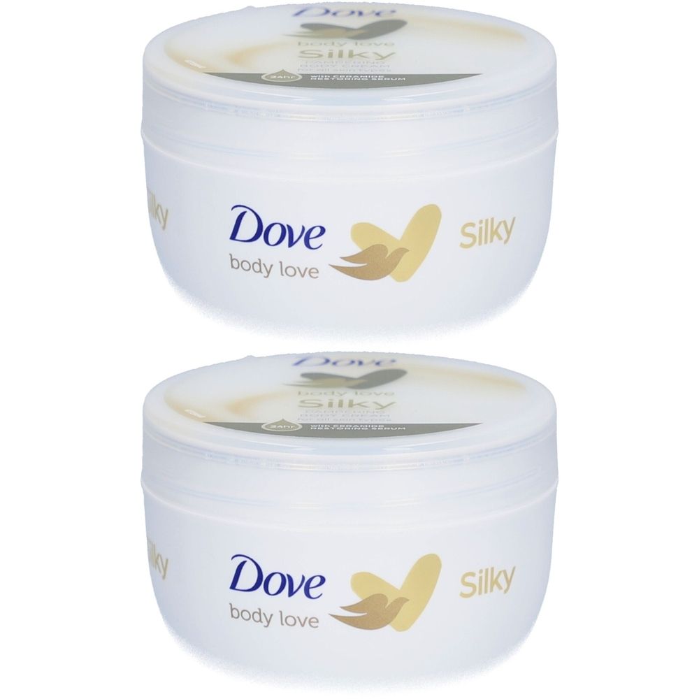 Deux pots blancs de Dove Body Love Silky Body Cream. Inscription Dove, logo et Silky. Couvercles avec inscription.