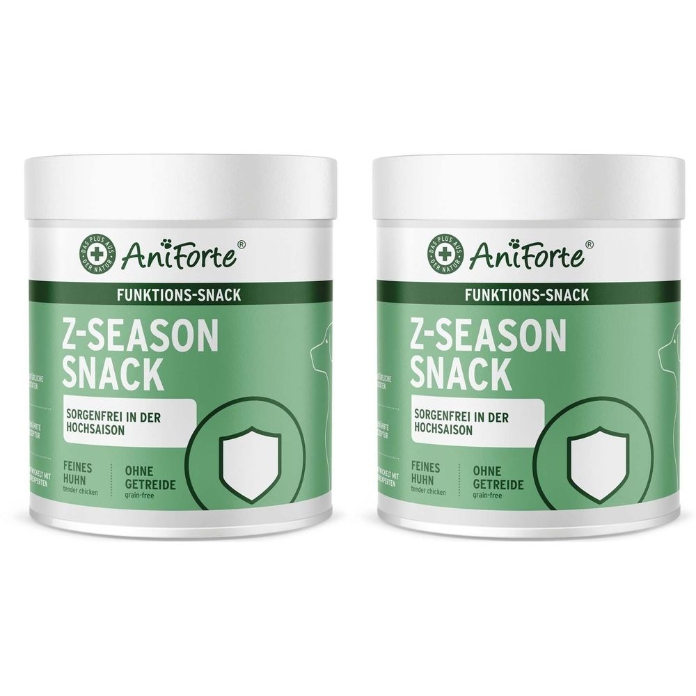Zwei weiße Dosen mit grünem Etikett. Auf dem Etikett steht "AniForte Z-SEASON SNACK". Text: "Sorgenfrei in der Hochsaison", "Feines Huhn", "Ohne Getreide".