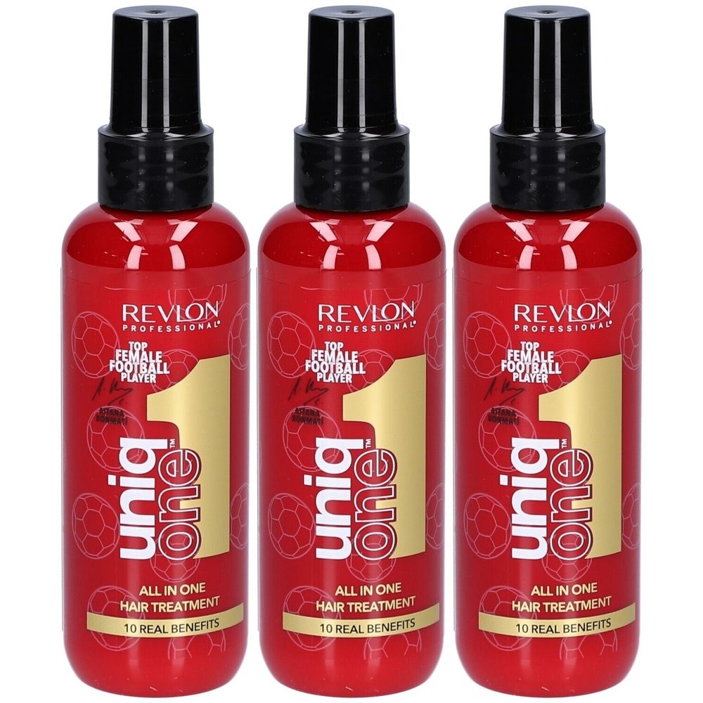 Trois flacons rouges avec vaporisateur noir. Chaque flacon porte l'inscription "Revlon Uniq One", "All in One Hair Treatment" et "10 Real Benefits".
