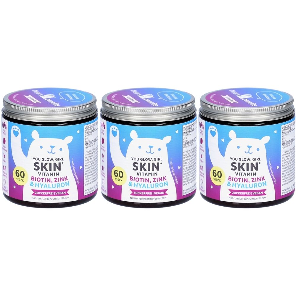 Drei Dosen Skin Vitamin mit Biotin, Zink & Hyaluron. Jede Dose hat einen Deckel und ein Etikett mit einem Bären-Design.