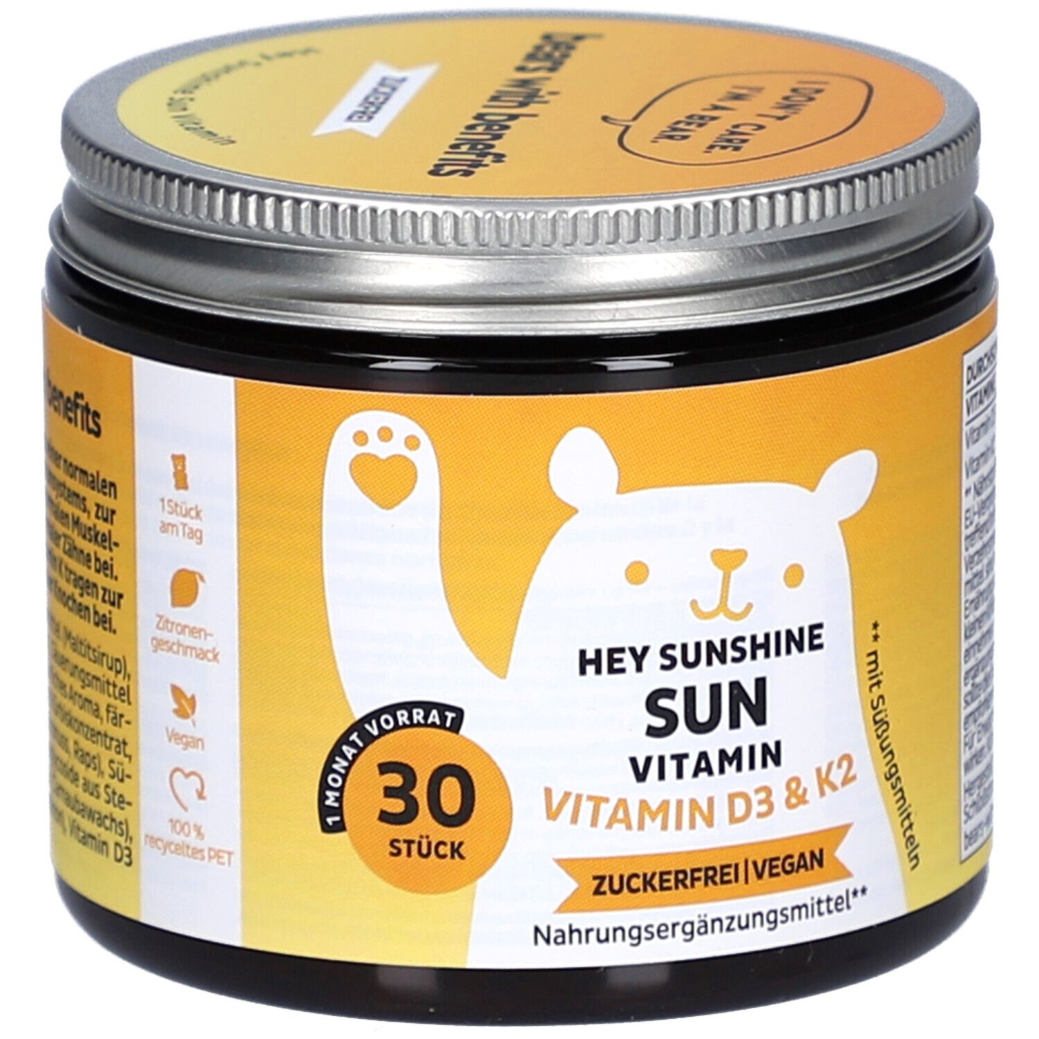 Dose mit Deckel. Aufschrift: HEY SUNSHINE SUN VITAMIN D3 & K2. 30 Stück. Zuckerfrei, vegan. Gelbes Etikett mit Bär.