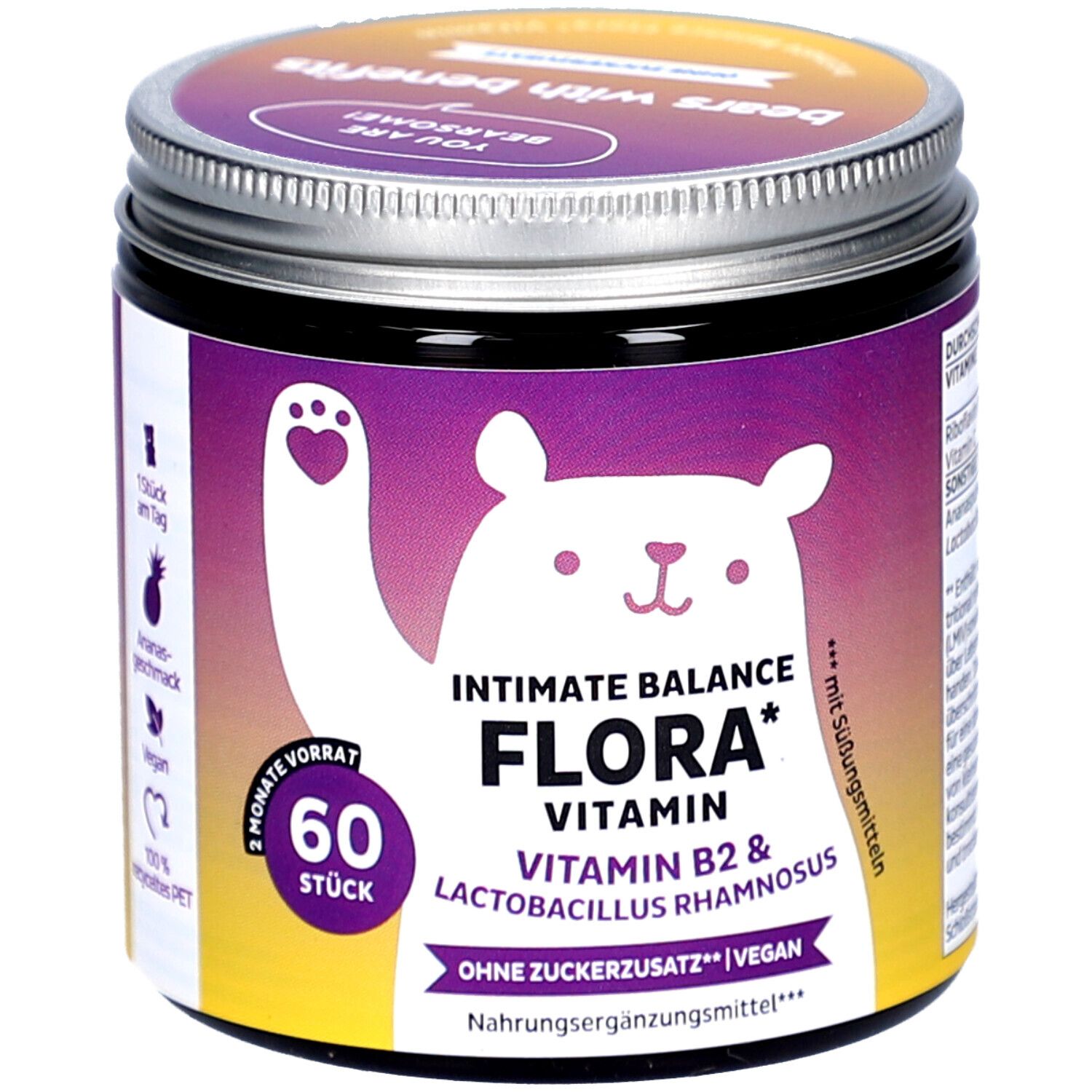 Dose mit Produktetikett. Aufschrift: Intimate Balance Flora Vitamin, 60 Stück, vegan. Bär-Illustration.