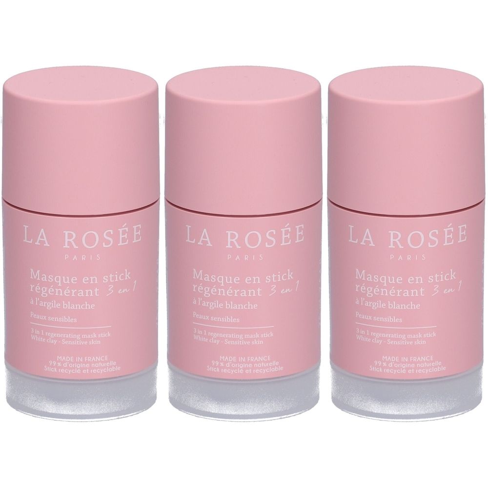 Trois bâtonnets de masque cylindriques roses. Inscription : La Rosée, Masque en stick régénérant 3 en 1, Argile blanche. Couvercles et bases transparents.