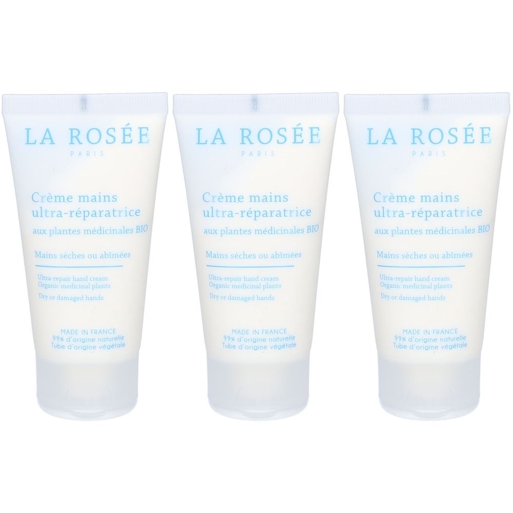 Drei Tuben Handcreme. Aufschrift: LA ROSÉE, Crème mains ultra-réparatrice, aux plantes médicinales BIO. Weiße Tube mit hellblauem Schriftzug.