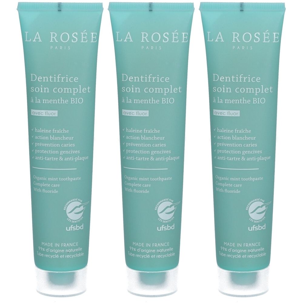 Trois tubes de dentifrice. Emballage turquoise avec texte blanc. Inscription : Dentifrice soin complet à la menthe BIO. Certification UFSBD.