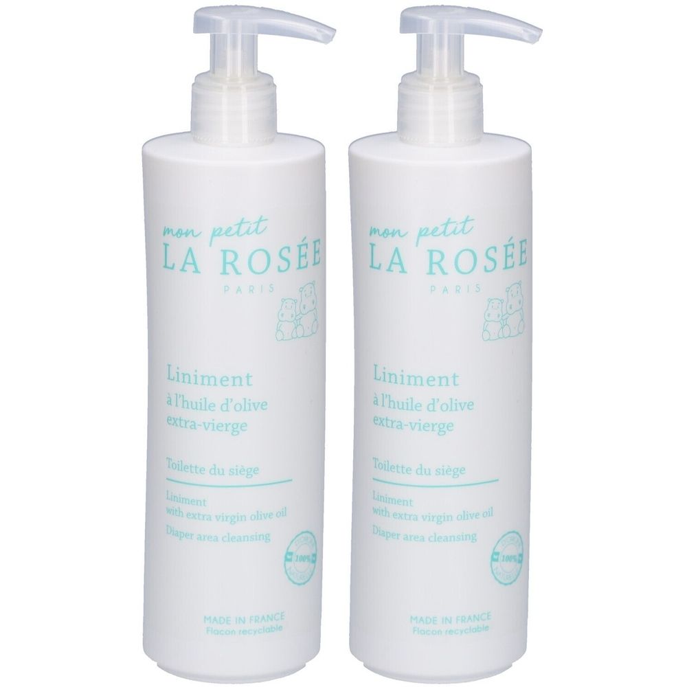 Deux flacons blancs avec pompe. Inscription: LA ROSÉE, Liniment à l'huile d'olive extra-vierge. Pour le nettoyage du siège.