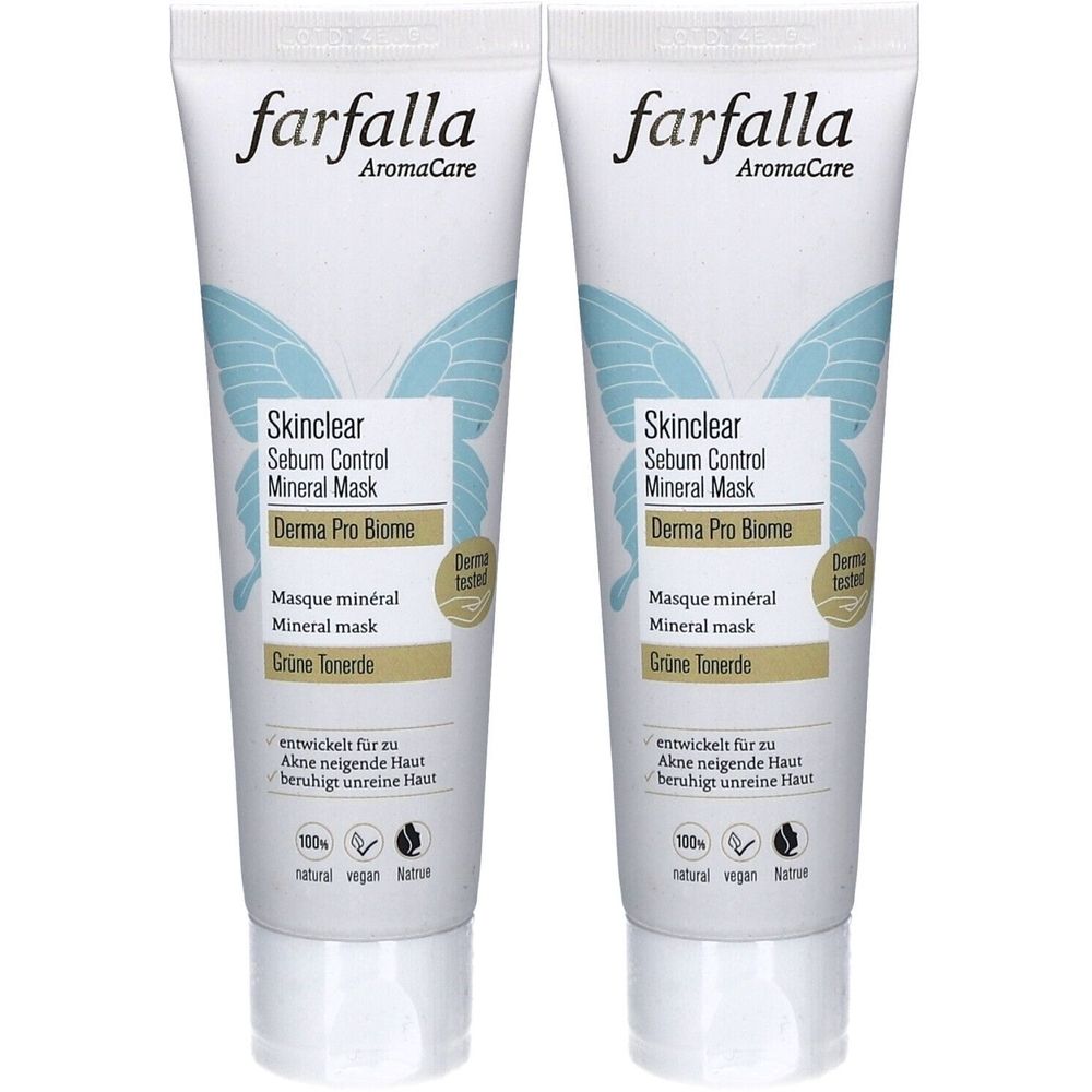 Deux tubes de masque Farfalla Skinclear. Tubes blancs avec ailes de papillon bleues et informations produit. Inscription : Skinclear, Sebum Control.