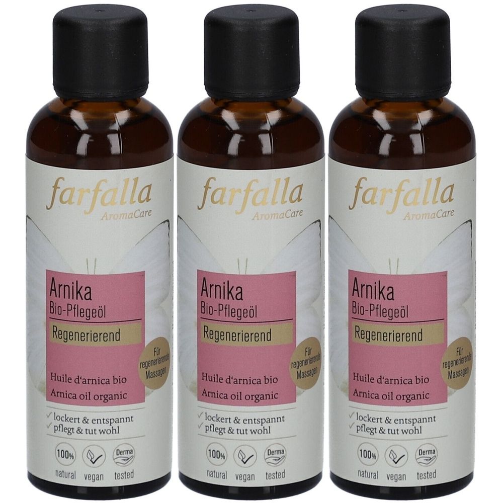 Drei Flaschen Farfalla Arnika Bio-Pflegeöl. Braune Glasflaschen mit schwarzem Deckel und Etikett mit Produktinformationen.