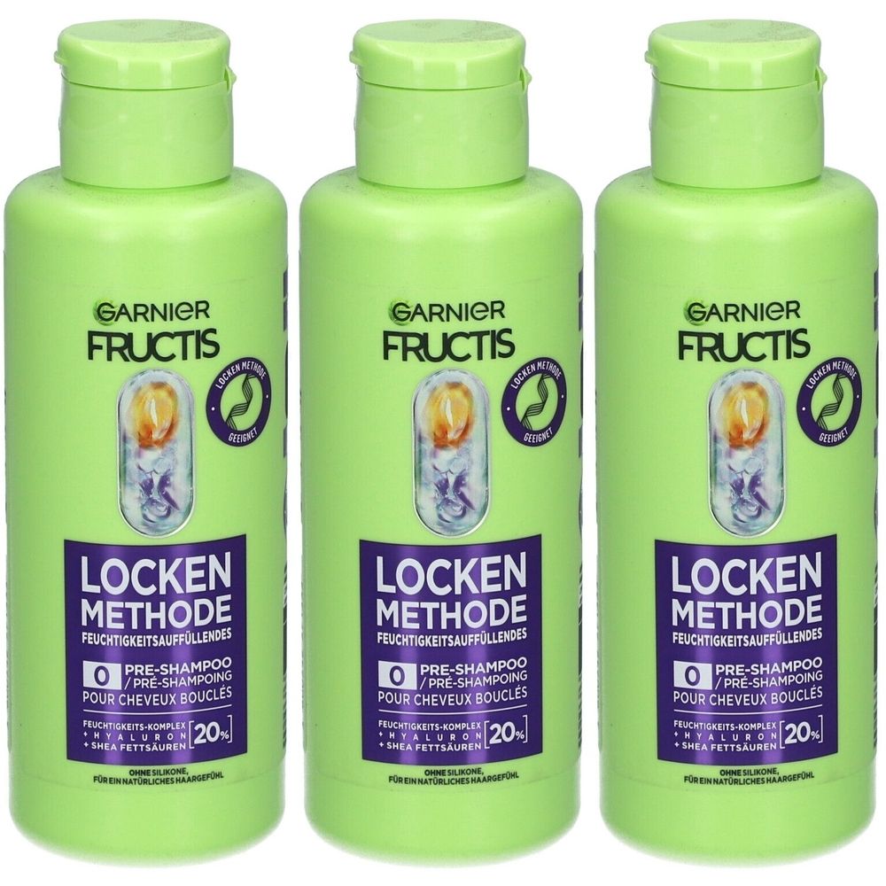 Drei grüne Flaschen mit grünen Deckeln. Auf jeder Flasche steht "GARNIER FRUCTIS LOCKEN METHODE".
