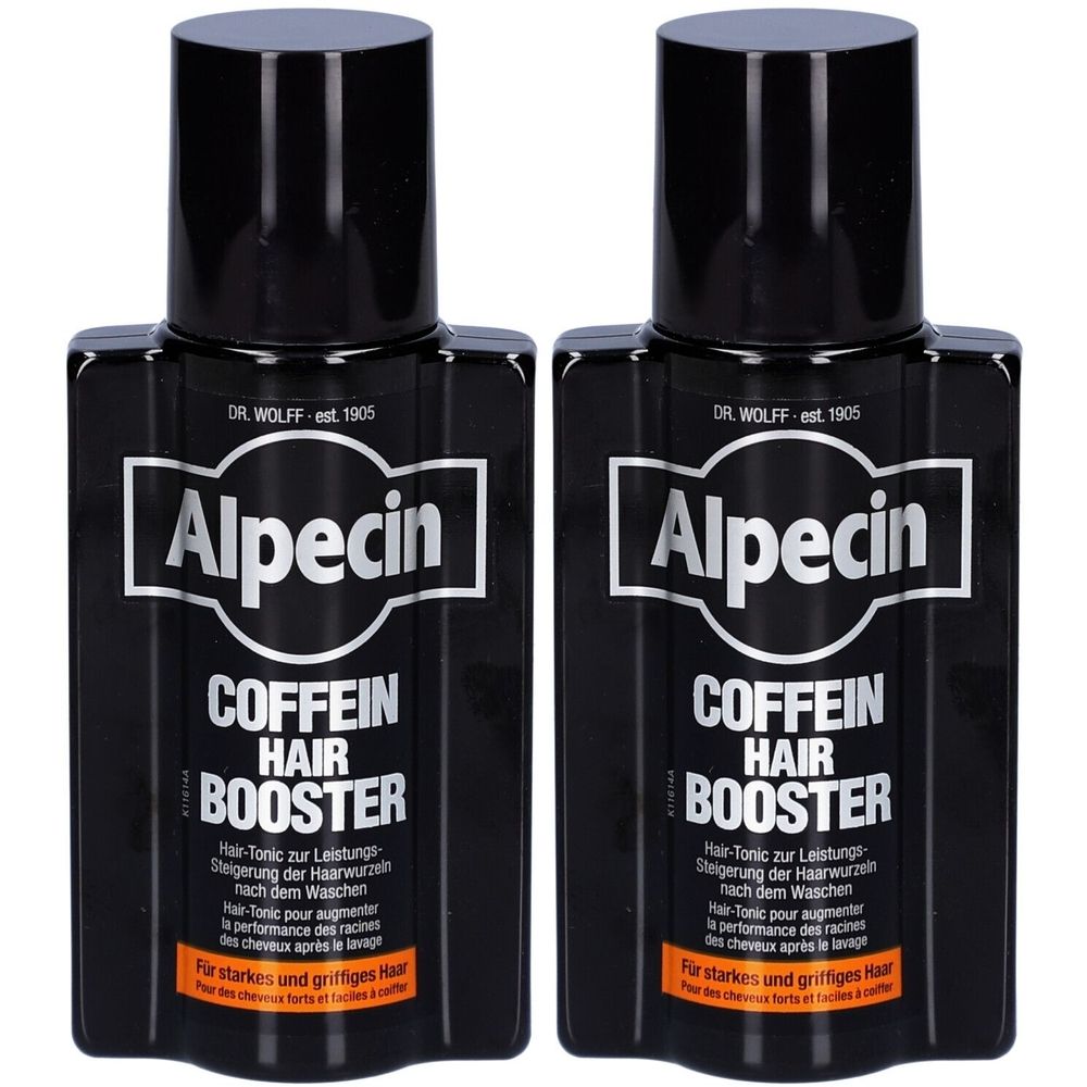 Deux flacons noirs avec bouchons noirs. Inscription: Alpecin Koffein Hair Booster. Texte en allemand et en français.