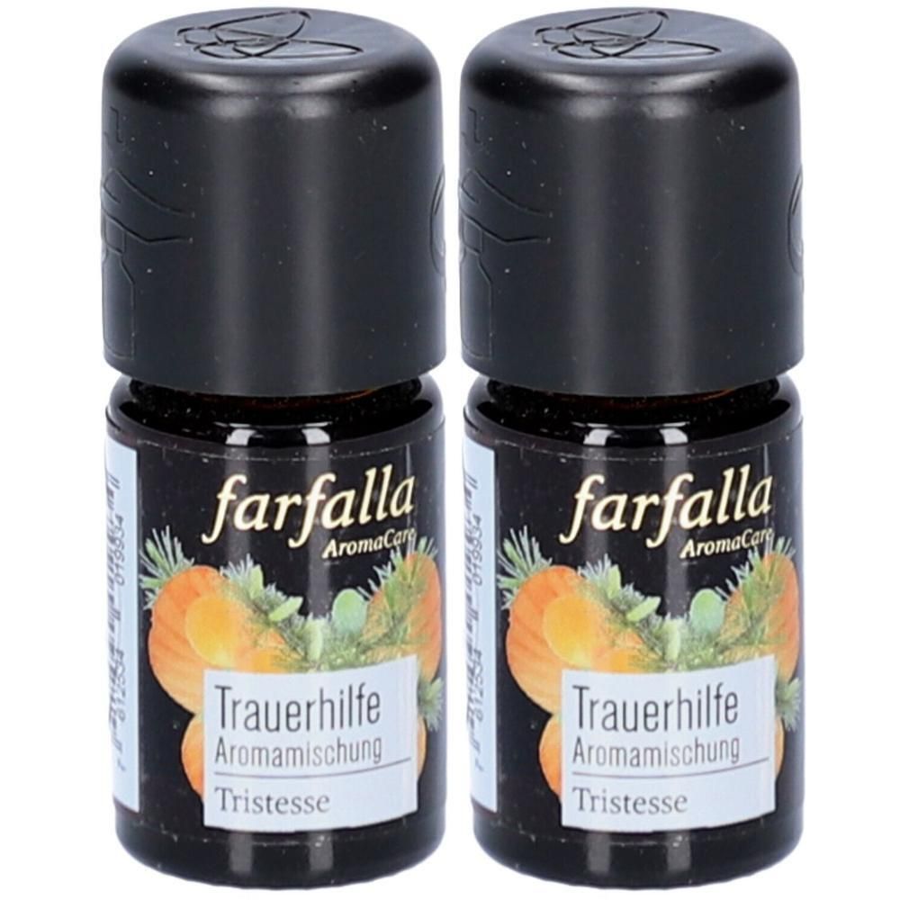 Deux petits flacons bruns avec bouchons noirs. Inscription: farfalla AromaCare, Trauerhilfe Aromamischung, Tristesse.