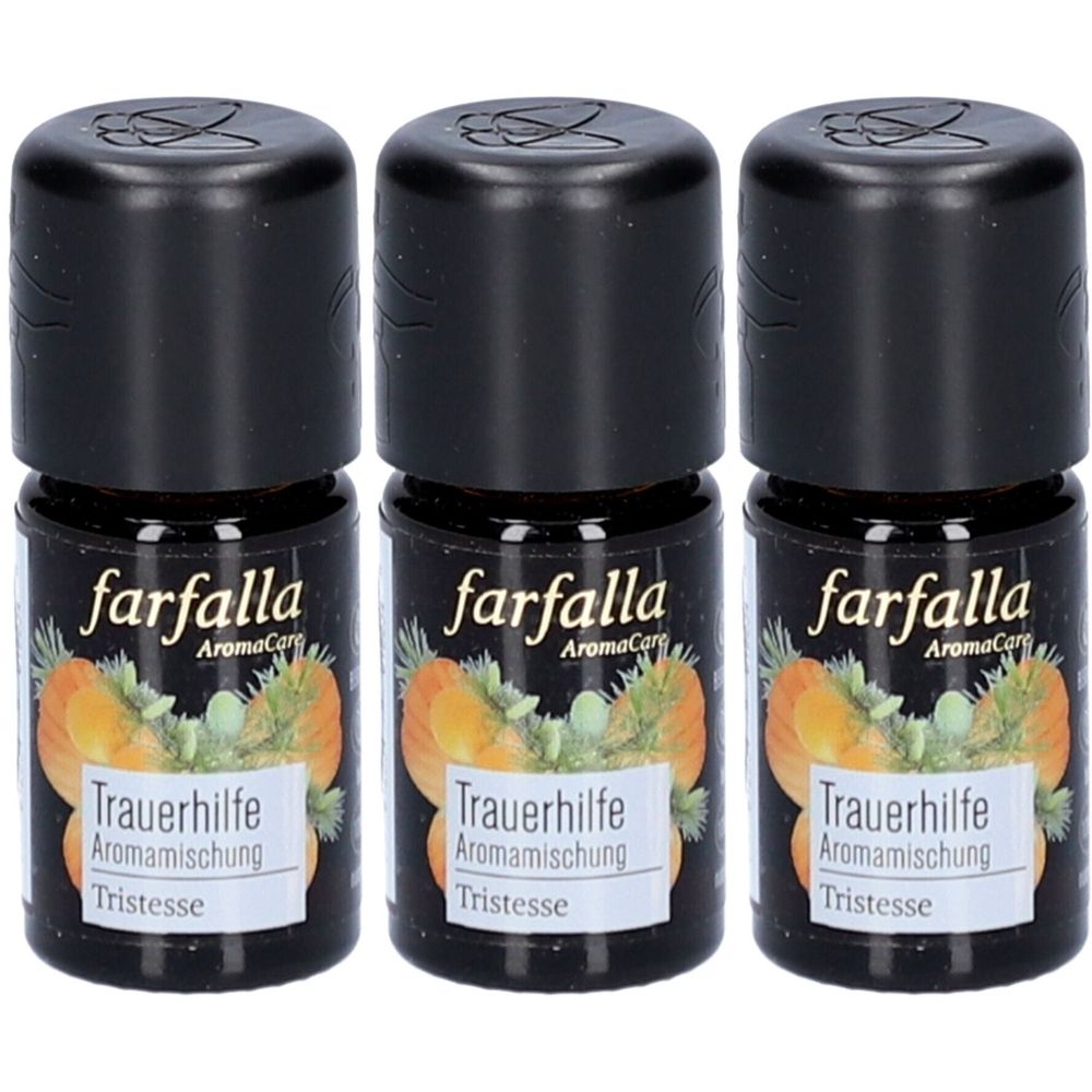 Trois petites bouteilles en verre brun avec des bouchons noirs. Les étiquettes indiquent "farfalla", "Trauerhilfe Aromamischung" et "Tristesse".