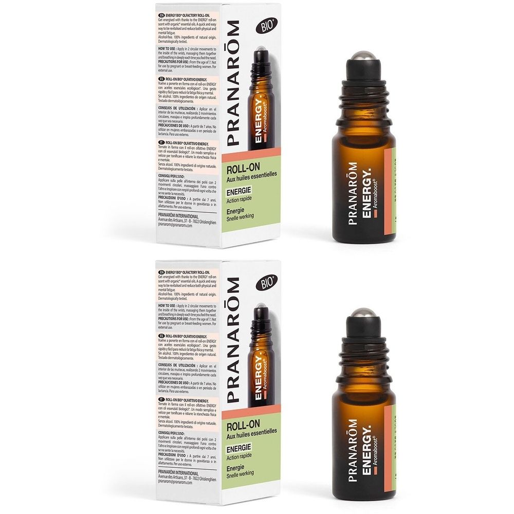 Braune Glasflasche mit Roll-On-Applikator. Aufschrift: PRANAROM ENERGY. BIO-Zertifizierung. Verpackung mit Produktinformationen.