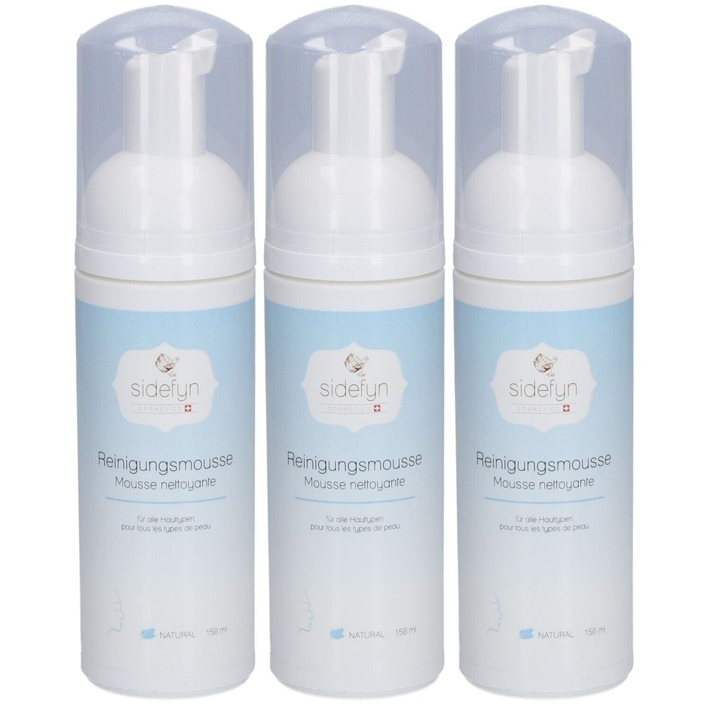 Trois flacons blancs avec étiquette bleue. Inscription : sidefyn Reinigungsmousse. Bouchon transparent. Pour tous types de peau.