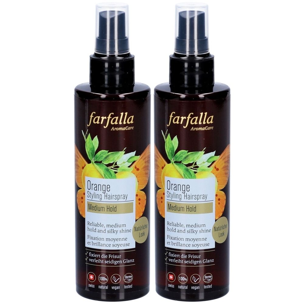 Zwei Flaschen Farfalla Orange Styling Haarspray. Braune Flaschen mit schwarzem Sprühkopf. Aufschrift: Orange Styling Hairspray, Medium Hold.