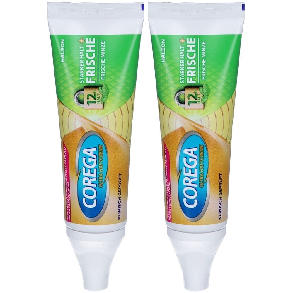 Zwei Tuben Haftcreme. Aufschrift: Corega, Frische Minze, Starker Halt. Klinisch geprüft. Grün, gelb und weiß.