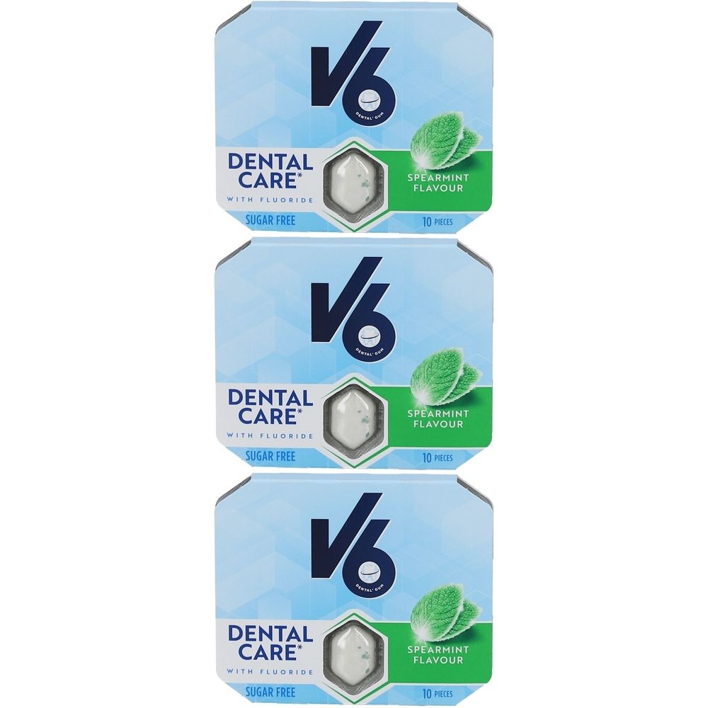 Trois paquets de chewing-gums. Emballage bleu avec logo V6, texte: Dental Care, Sugar Free, Spearmint Flavour. Dix pièces.
