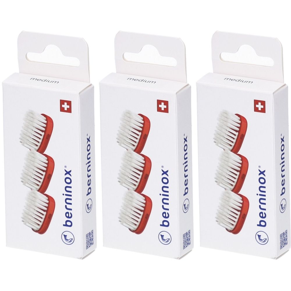 Drei Verpackungen mit Ersatz-Bürstenköpfen. Jede Packung zeigt drei Bürstenköpfe mit rotem Rahmen und weißen Borsten. Marke: berninox.