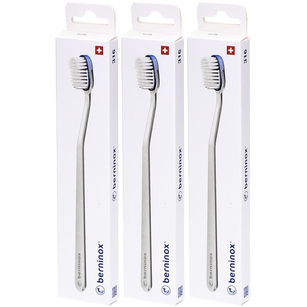 Trois brosses à dents dans des emballages blancs. Les brosses ont un manche argenté et une tête bleue. Le logo et la marque "berninox" sont visibles sur les emballages.