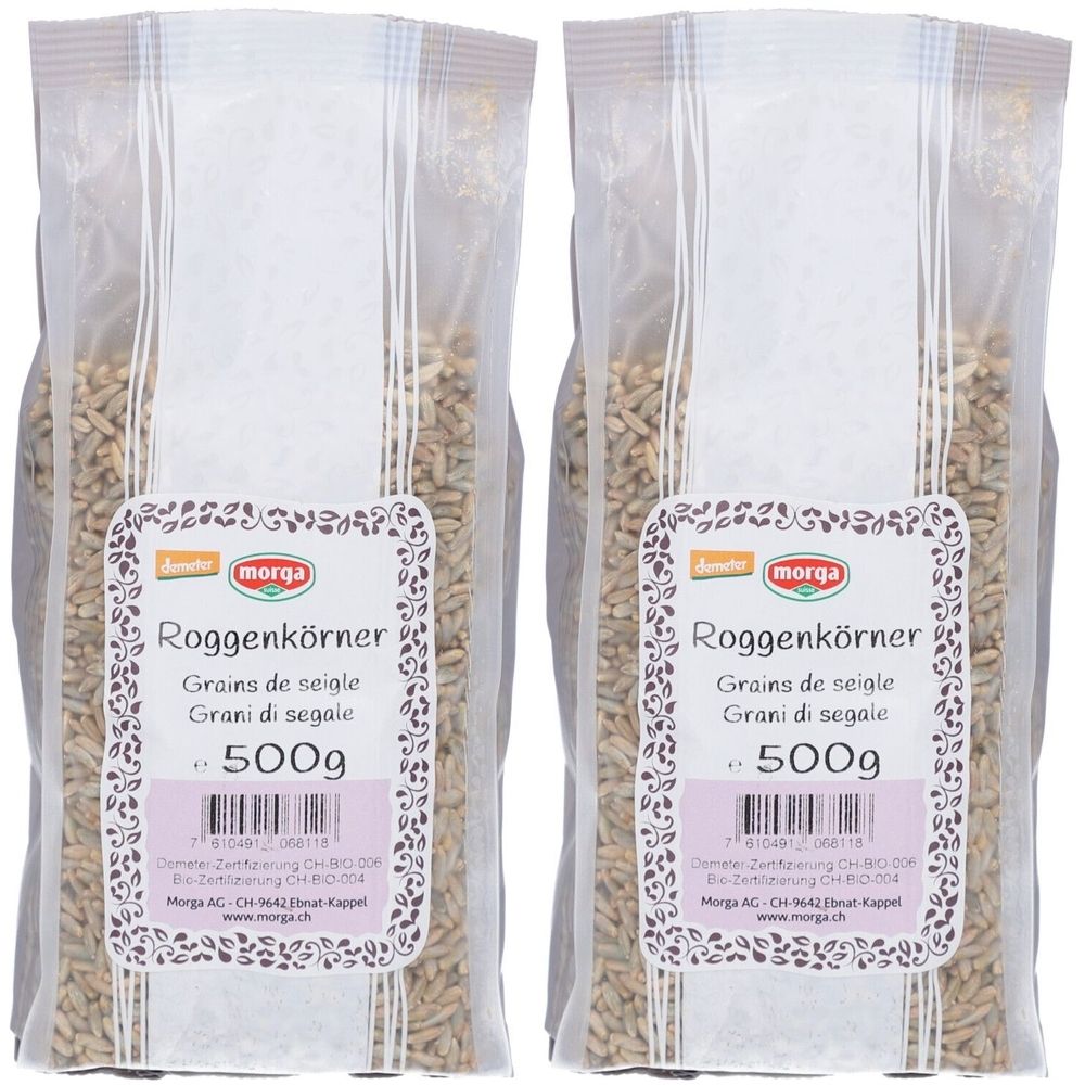 Deux paquets de grains de seigle. Inscription: MORGA Roggenkörner, 500g. Label Demeter. Emballage transparent avec détails blancs.
