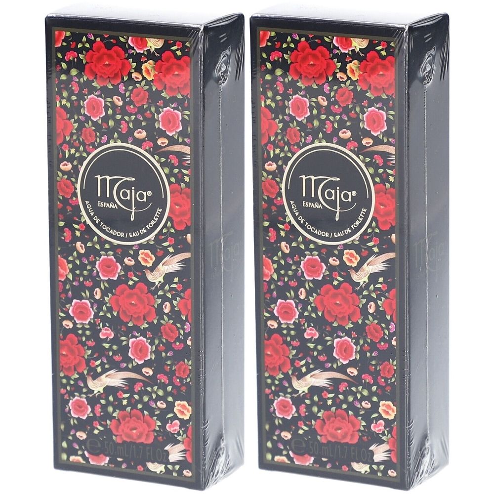 Zwei rechteckige Verpackungen. Schwarzer Hintergrund mit roten Rosen und Vögeln. Aufschrift Maja. Eau de Toilette.