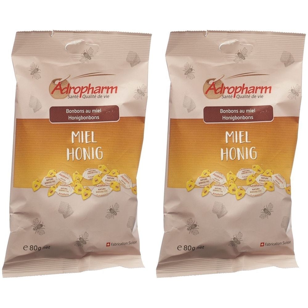 Deux sachets de bonbons au miel. Inscription : Adropharm, Miel Honig, Bonbons au miel. Emballage avec motifs d'abeilles.