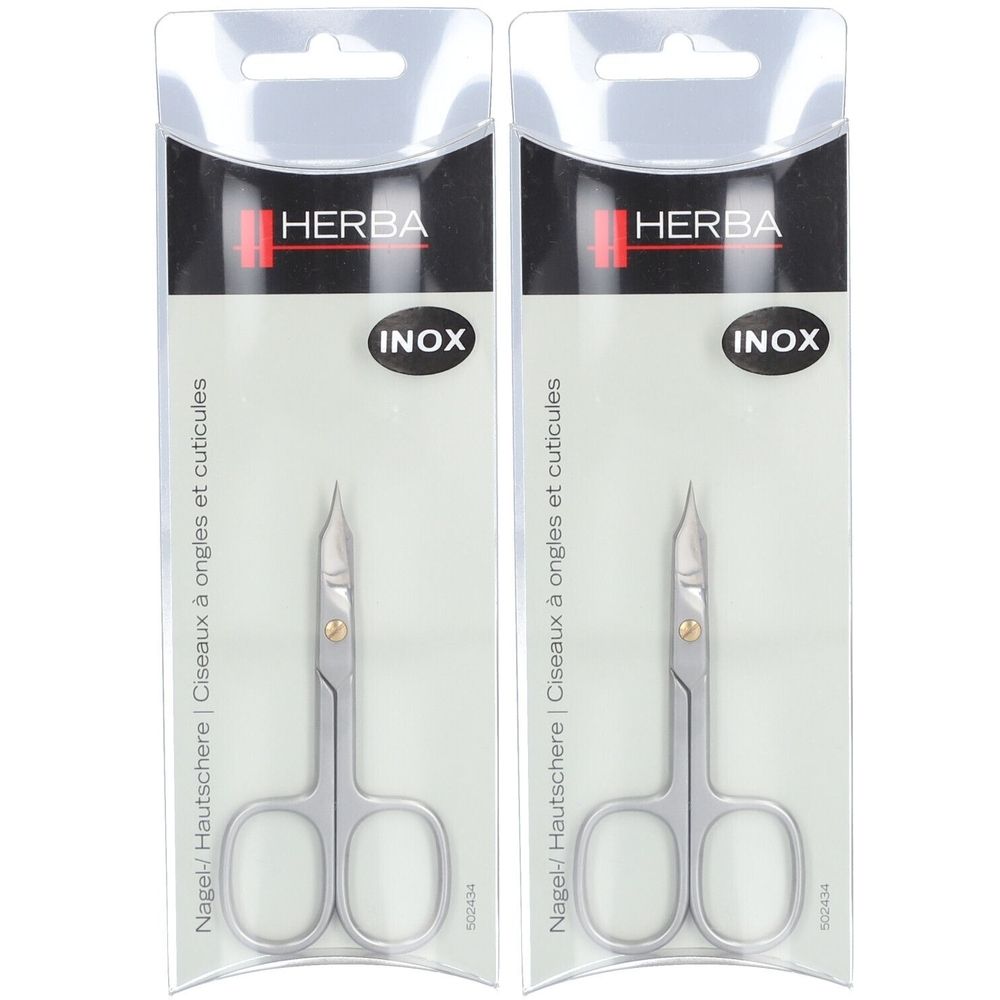 Zwei Nagel-Hautscheren in Verpackung. Marke HERBA, INOX. Aufschrift: Nagel-/ Hautschere, Ciseaux à ongles et cuticules.