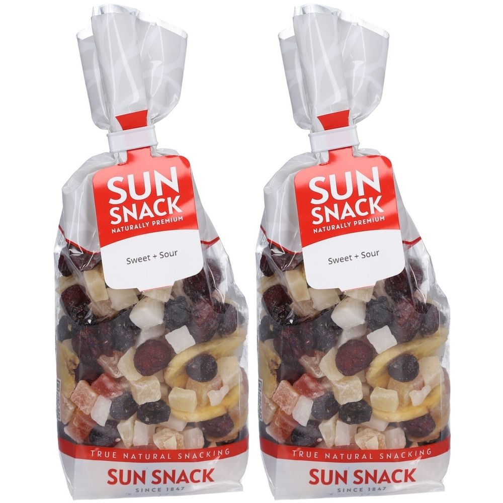 Deux sachets de SUN SNACK mélange aigre-doux. Emballage transparent avec étiquette rouge. Inscription : SUN SNACK, Sweet + Sour.