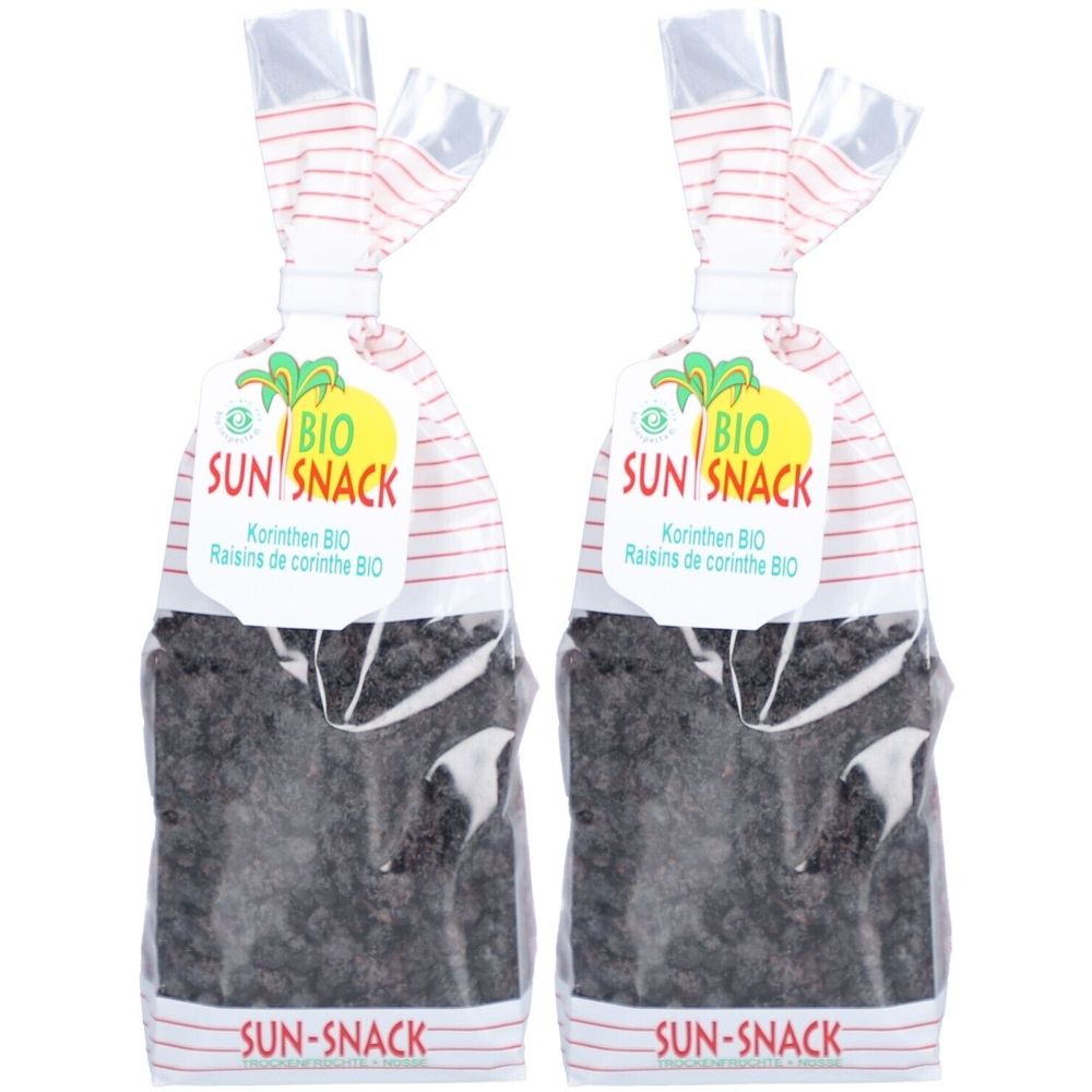 Deux sachets de raisins secs BIO SUN SNACK. Emballage transparent à rayures blanches et rouges. Inscription : BIO SUN SNACK, Korinthen BIO, Raisins de corinthe BIO.