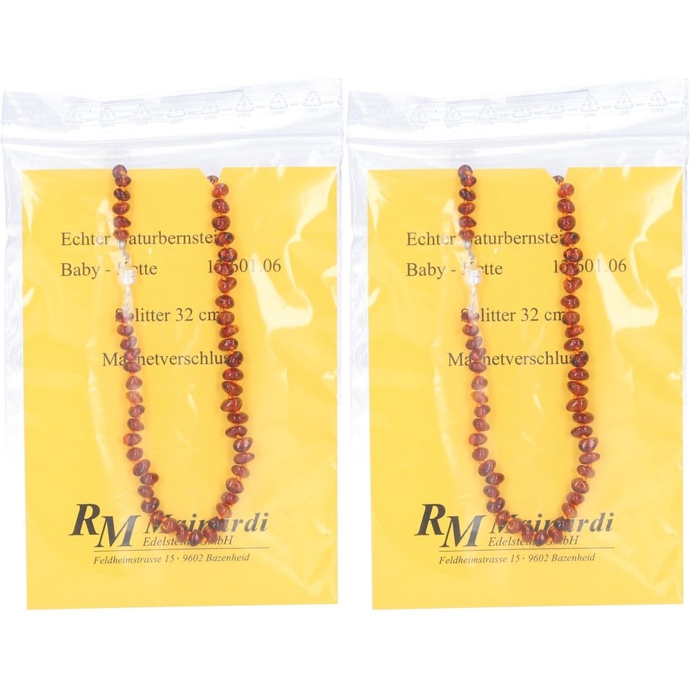 Zwei Babyketten aus Naturbernstein mit Magnetverschluss in Verpackung. Auf gelbem Hintergrund, mit Produktinformationen.
