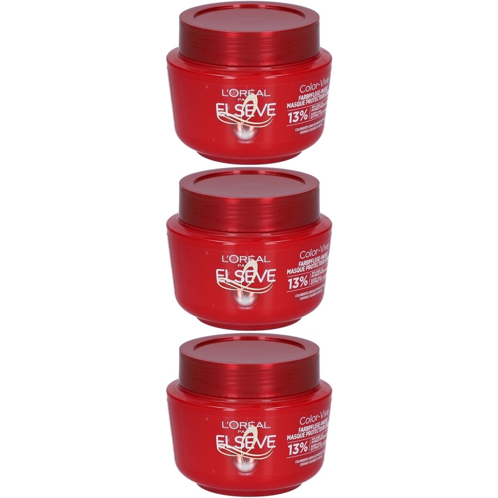 Trois pots rouges avec couvercles. Inscription: L'Oréal, Elseve. Étiquette avec texte et 13%.